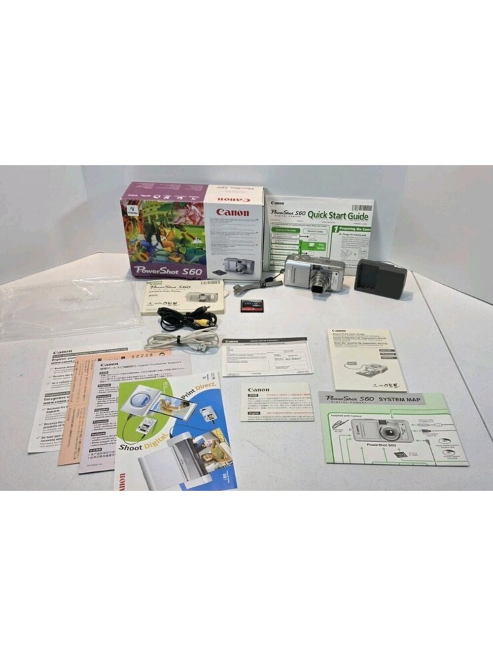 Canon PowerShot S60 5MP Digital Camera Tested Working Box Charger Battery Bundle